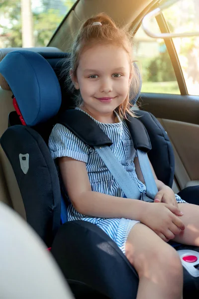 Little girl buckled in car safety seat — Stock Photo, Image