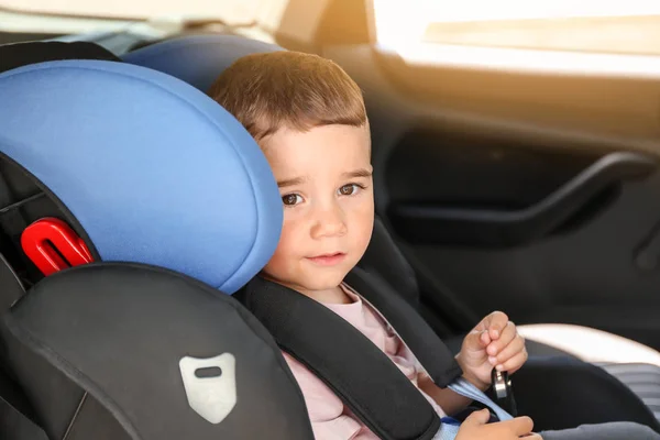 Baby boy buckled in car seat — Stock Photo, Image