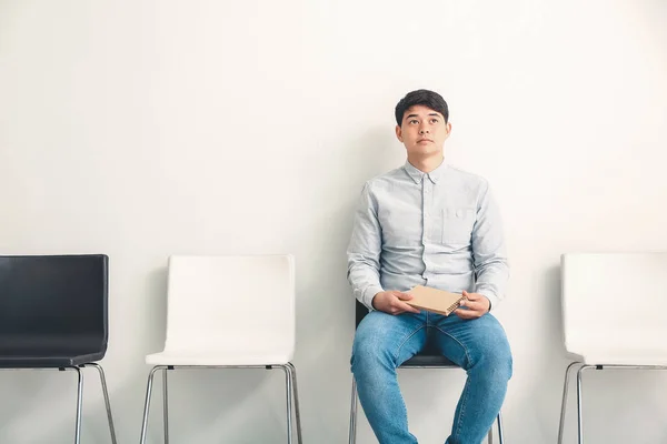 Asian man waiting for job interview indoors — Stock Photo, Image