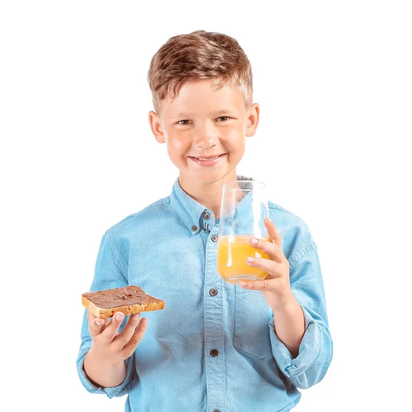 Zabawny mały chłopiec z smacznym tosty i kieliszek soku na białym tle — Zdjęcie stockowe