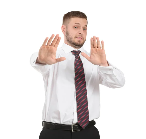 Geschäftsmann mit Panikattacke auf weißem Hintergrund — Stockfoto