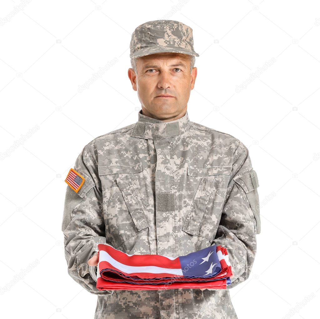 Mature male soldier with USA flag on white background