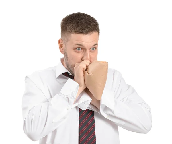 Businessman having panic attack on white background — Stock Photo, Image