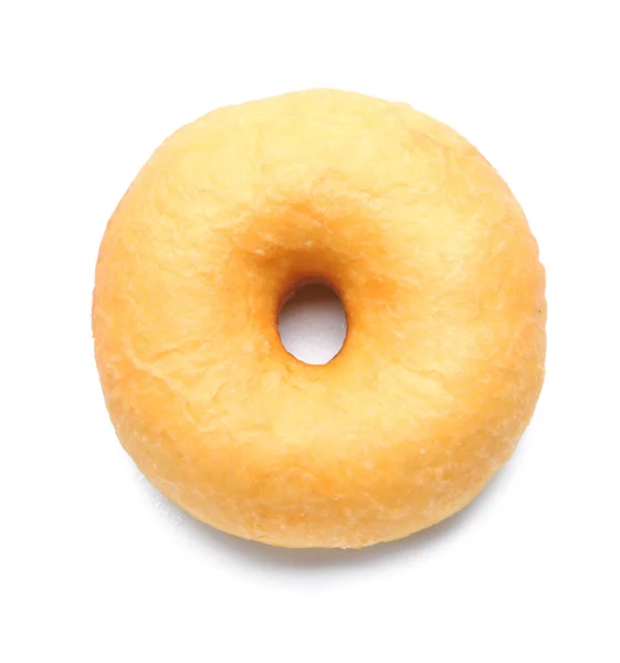 Doce saboroso donut no fundo branco — Fotografia de Stock
