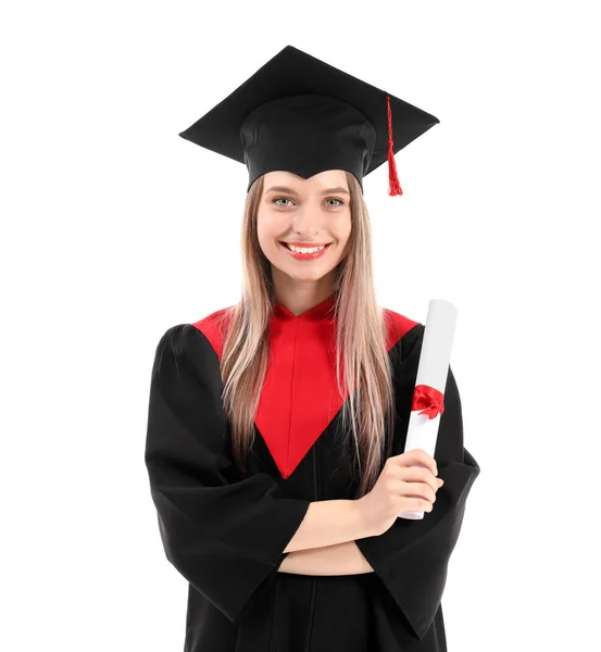 Mladá studentka ve bakalářské róbě a s diplomem na bílém pozadí — Stock fotografie