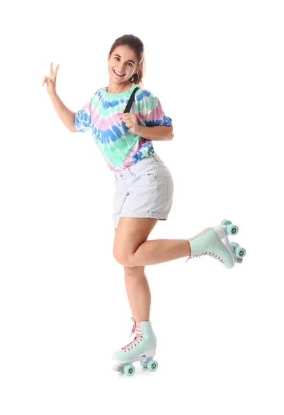 Teenage girl on roller skates against white background — Stock Photo, Image