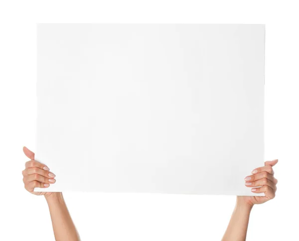 Mãos femininas com cartaz em branco no fundo branco — Fotografia de Stock