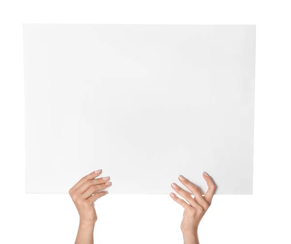 Manos femeninas con póster en blanco sobre fondo blanco — Foto de Stock