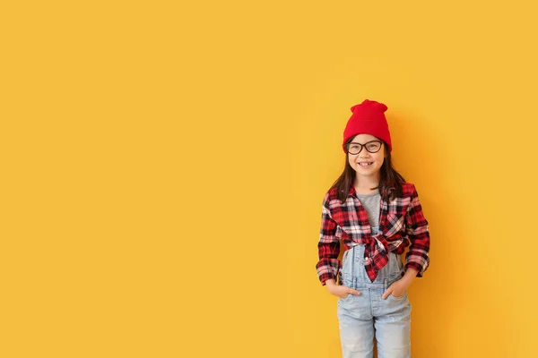 Portrait of stylish little girl on color background — Stock Photo, Image