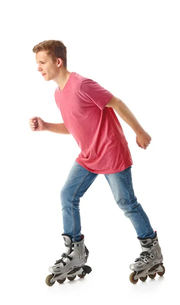 Adolescente em patins contra fundo branco — Fotografia de Stock