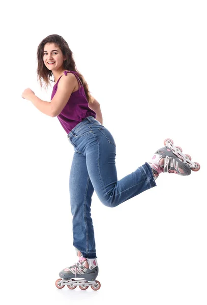 Teenager-Mädchen auf Rollschuhen vor weißem Hintergrund — Stockfoto