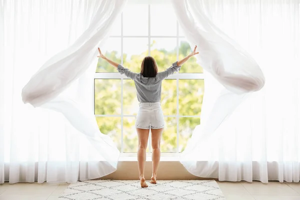 Morning of beautiful young woman near window — Stock Photo, Image