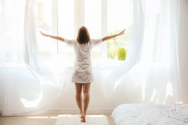 Morning of beautiful young woman near window — Stock Photo, Image