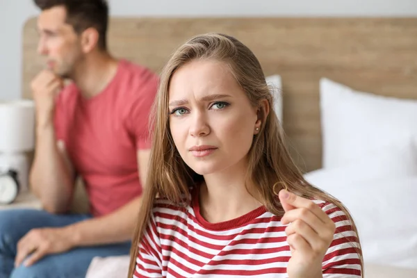 Unhappy woman with wedding ring after quarrel at home. Concept of divorce — Stock Photo, Image