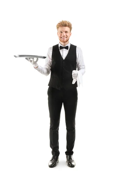 Knappe kelner met lege lade op witte achtergrond — Stockfoto
