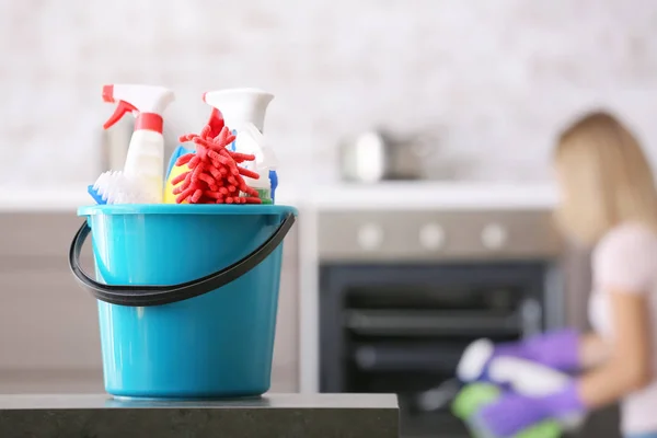 Set of cleaning supplies in kitchen — Stock Photo, Image