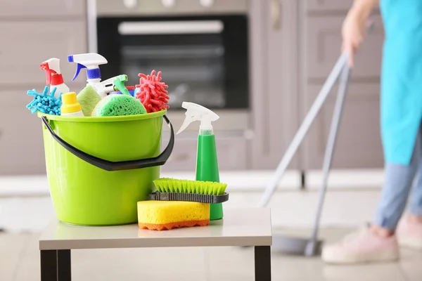 Set of cleaning supplies in kitchen — Stock Photo, Image