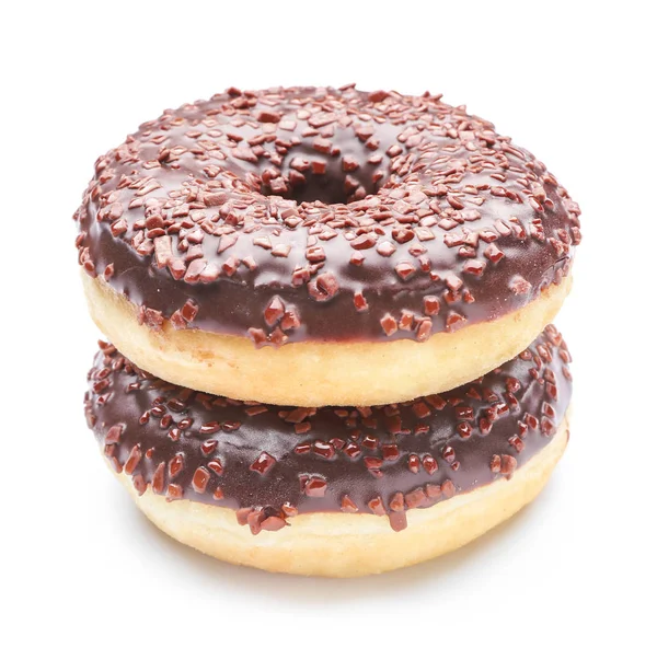 Süße leckere Donuts auf weißem Hintergrund — Stockfoto
