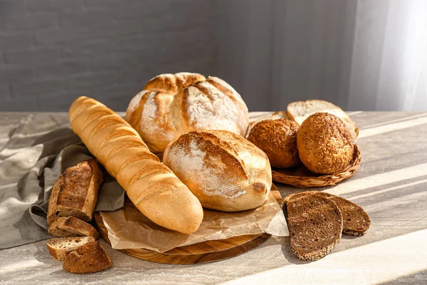 Assortment of fresh bread on table — Stock Photo, Image