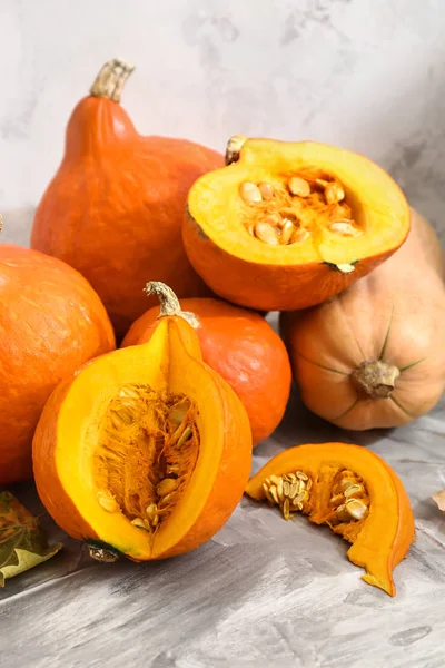 Fresh pumpkins on grunge background — Stock Photo, Image