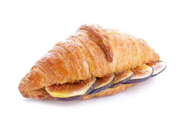 Sweet croissant and fig fruit slices on white background — Stock Photo, Image