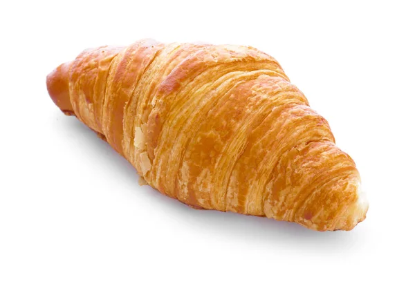 Süßes Croissant auf weißem Hintergrund — Stockfoto