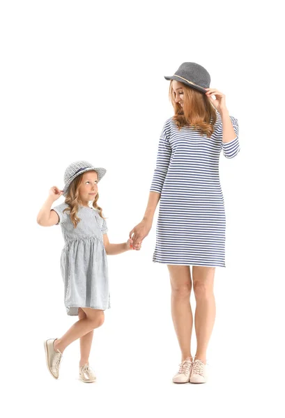 Portrait of beautiful woman with her little daughter on white background — Stock Photo, Image