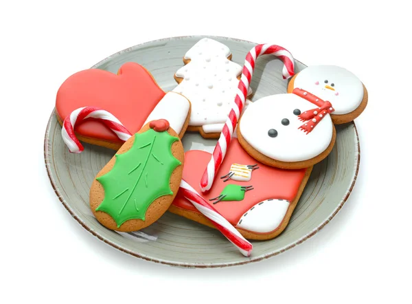 Plate with tasty Christmas cookies on white background — Stock Photo, Image