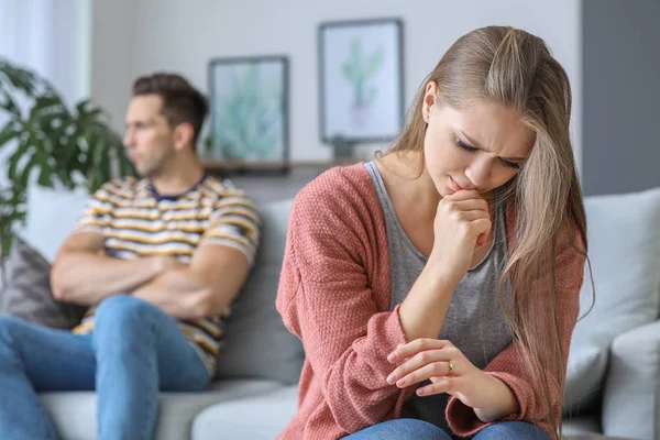 Sad woman after quarrel with husband at home. Concept of divorce — Stock Photo, Image
