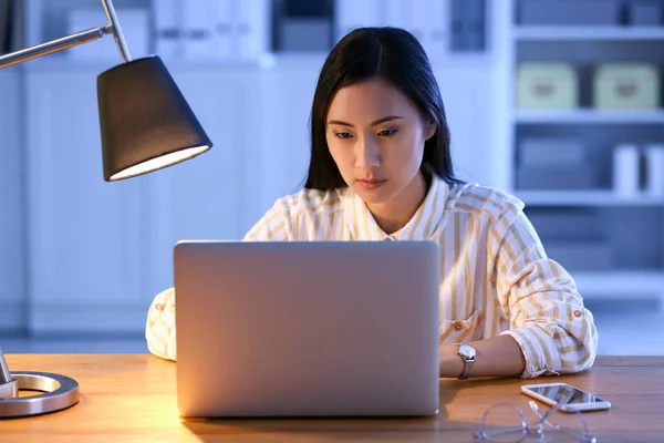 Young Asian student preparing for exam late in evening — Stock Photo, Image