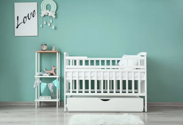 Interior of modern baby room with crib — Stock Photo, Image