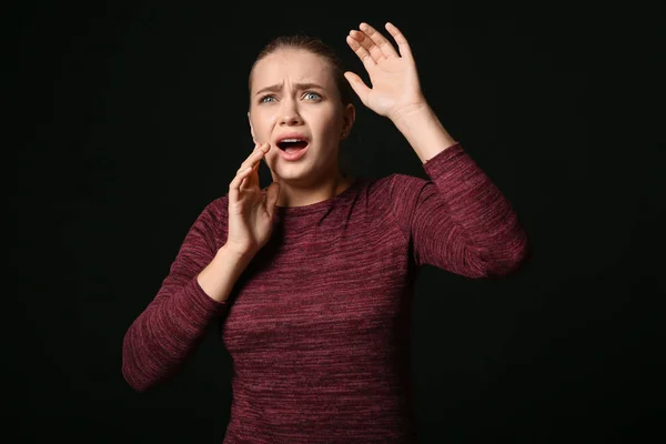 Woman having panic attack on dark background — Stock Photo, Image