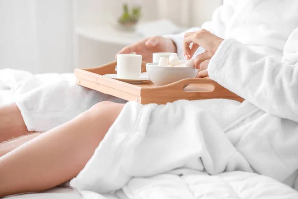 Morning of happy young couple having breakfast in bed — Stock Photo, Image