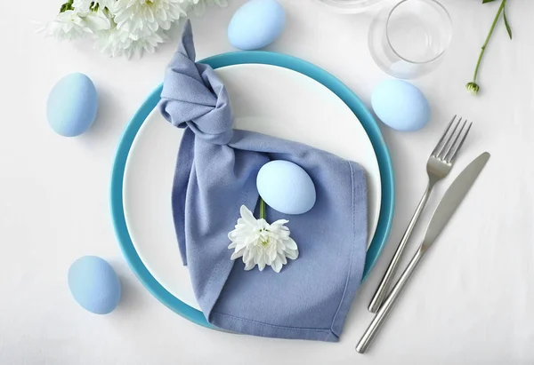 Table setting for Easter celebration on white background — Stock Photo, Image
