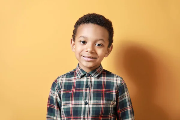 Cute African-American boy on color background — Stock Photo, Image