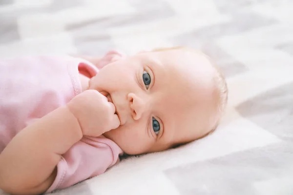 Cute little baby lying on bed — Stock Photo, Image