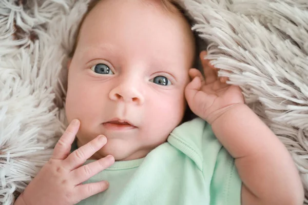 Cute little baby lying on bed — Stock Photo, Image