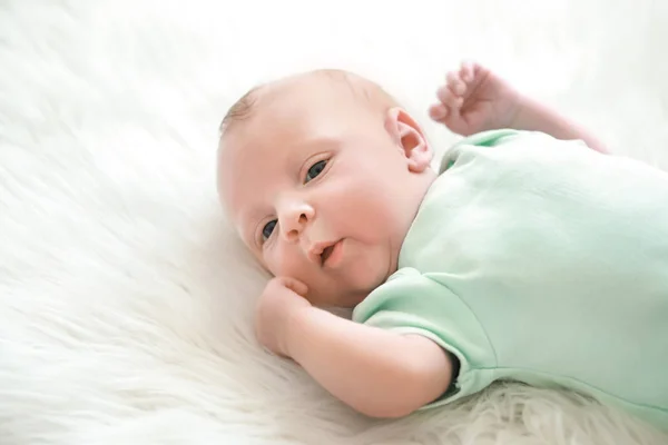 Cute little baby lying on bed — Stock Photo, Image