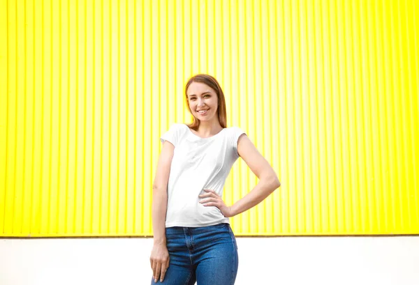 Woman in stylish t-shirt on color background — Stock Photo, Image