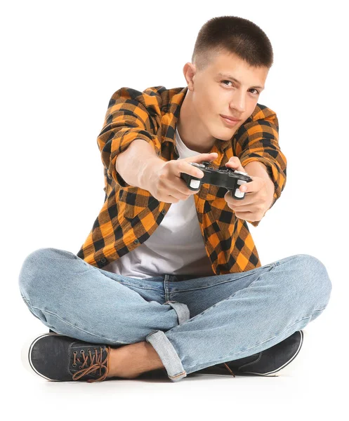 Tiener jongen spelen video game op witte achtergrond — Stockfoto