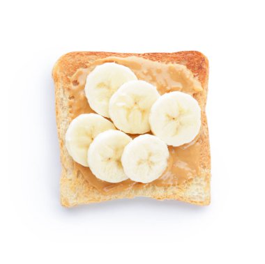 Beyaz arka planda muz ve fıstık ezmesi ile lezzetli tost ekmeği