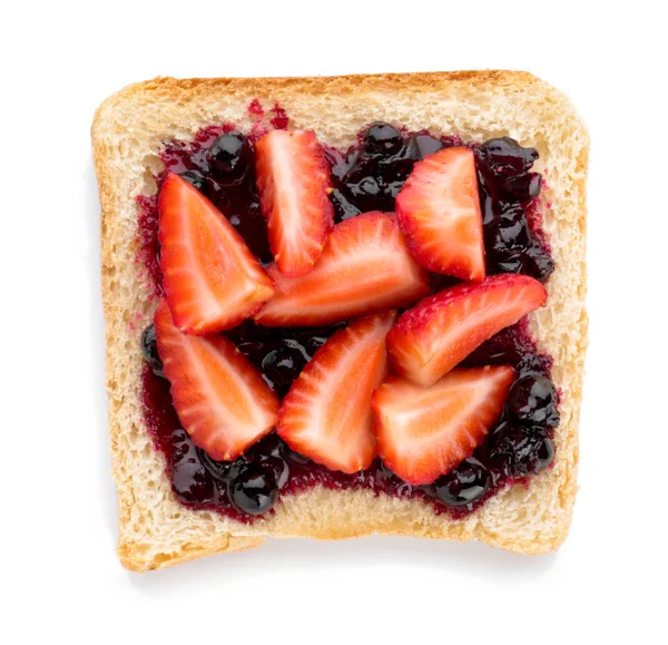 Tasty toasted bread with jam and strawberry on white background — Stock Photo, Image