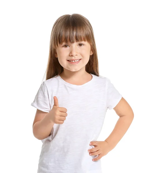 Little girl in stylish t-shirt showing thumb-up on white background — Stock Photo, Image