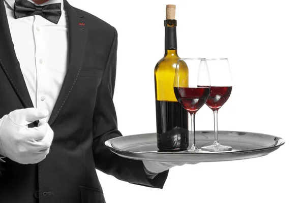 Camarero guapo con vino sobre fondo blanco, primer plano —  Fotos de Stock
