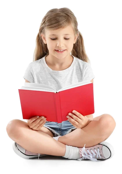 Menina com livro sobre fundo branco — Fotografia de Stock