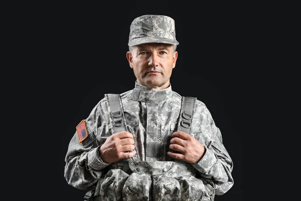 Mature male soldier on dark background — Stock Photo, Image