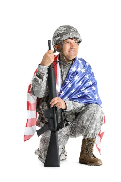 Mature male soldier with USA flag on white background — Stock Photo, Image