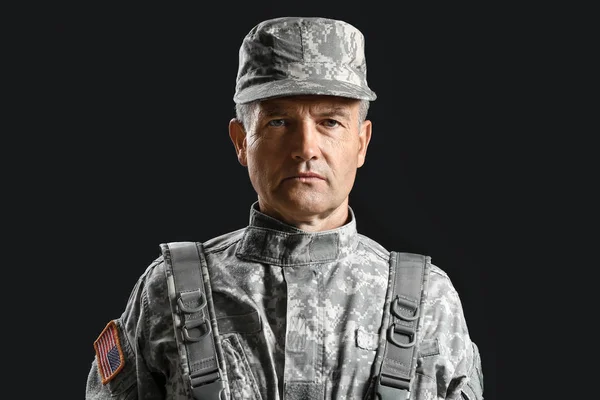 Mature male soldier on dark background — Stock Photo, Image