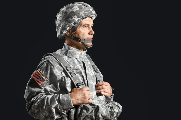 Mature male soldier on dark background — Stock Photo, Image