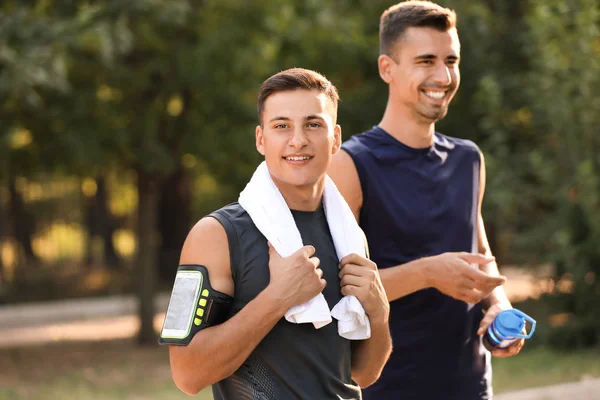Sporty young people after training outdoors — Stock Photo, Image